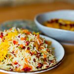 طرز تهیه مرصع پلو مجلسی با مرغ، زرشک و خلال؛ رنگین‌کمانی از طعم و زیبایی